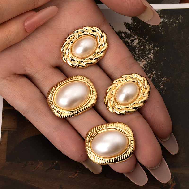 French cross-border exquisite titanium steel earrings retro vortex pearl stud earrings niche design simple and versatile earrings wholesale