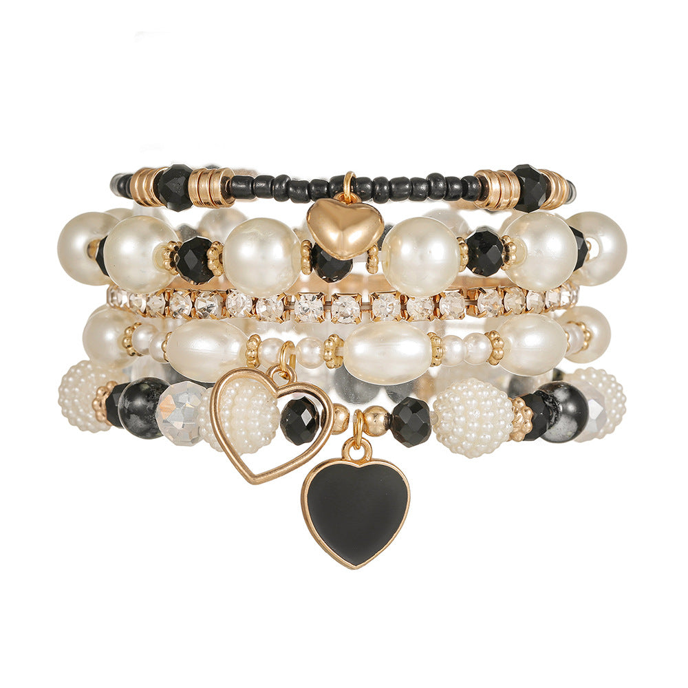 Cross-border European and American 5-piece bracelet, imitation pearl handmade beaded female Bohemian fashion dripping oil peach heart bracelet female