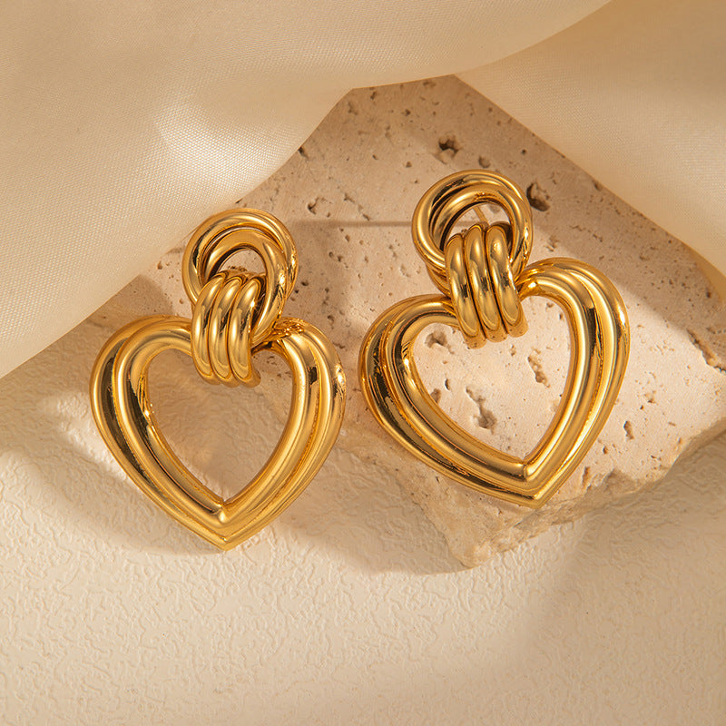 European and American retro titanium steel round stud earrings fashion niche geometric earrings light luxury high sense love earrings women's wholesale