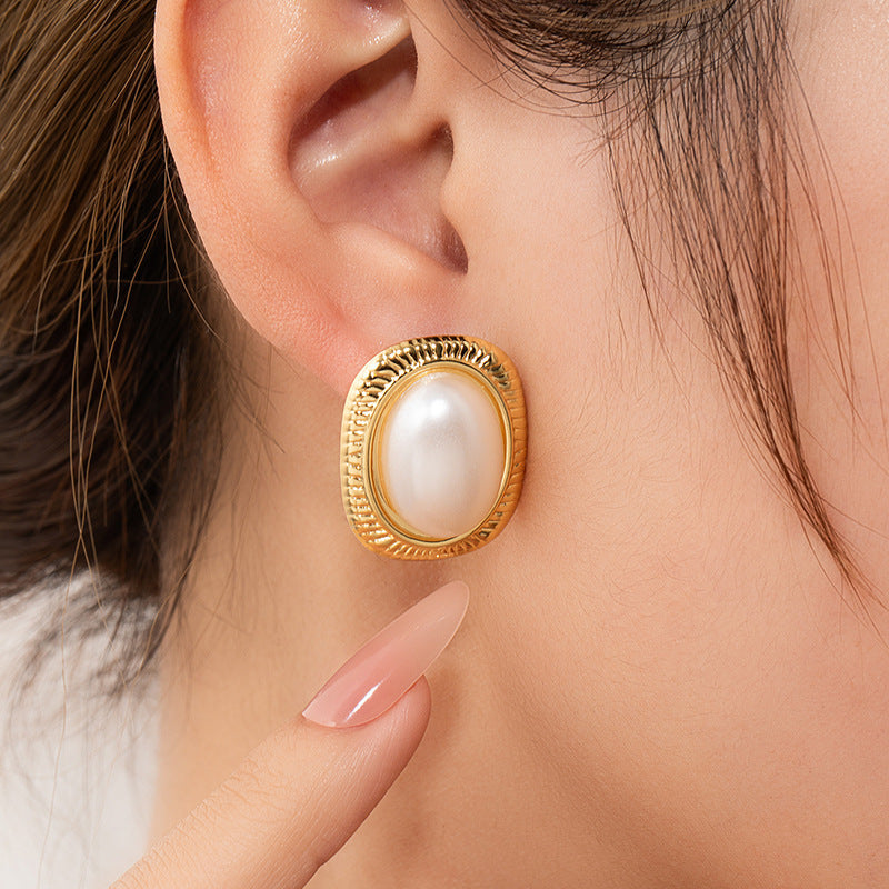 French cross-border exquisite titanium steel earrings retro vortex pearl stud earrings niche design simple and versatile earrings wholesale