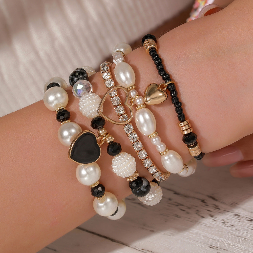 Cross-border European and American 5-piece bracelet, imitation pearl handmade beaded female Bohemian fashion dripping oil peach heart bracelet female