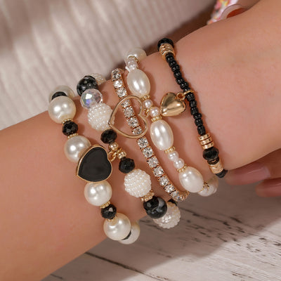 Cross-border European and American 5-piece bracelet, imitation pearl handmade beaded female Bohemian fashion dripping oil peach heart bracelet female