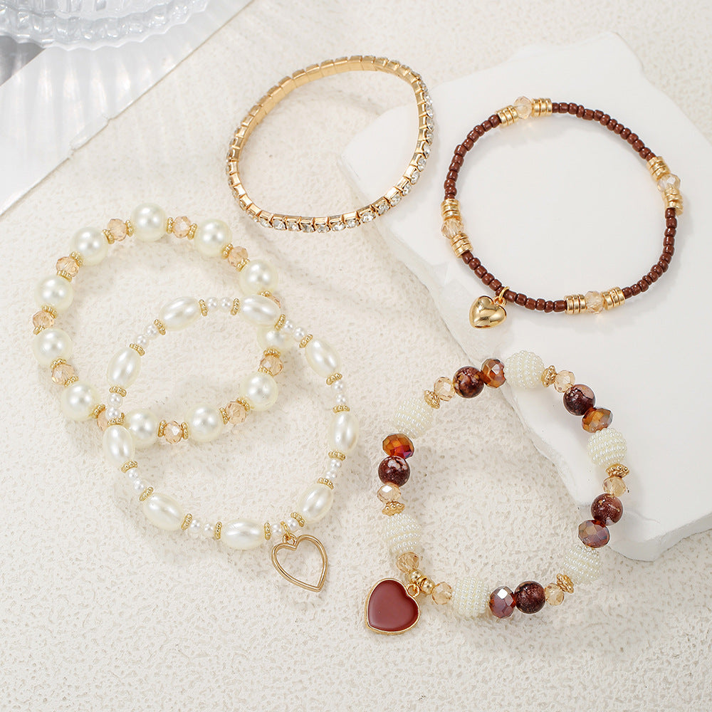Cross-border European and American 5-piece bracelet, imitation pearl handmade beaded female Bohemian fashion dripping oil peach heart bracelet female